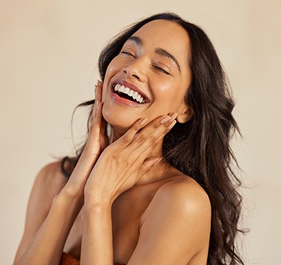 Portrait of happy woman with beautiful skin